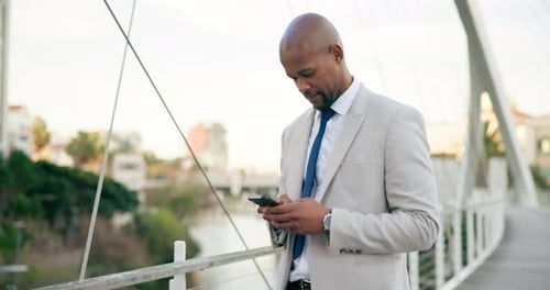 Phone, city and face of business black man for contact, typing email and networking