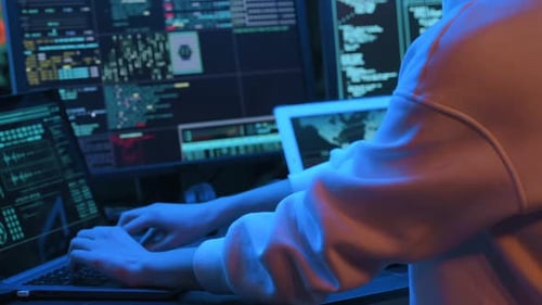 Typing at Computer with Multiple Screens in Dark Room