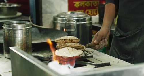 Man Cooking Street Food on