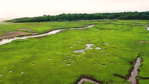 Drone Footage of Gloucester Marsh with Wetlands, Tidal Creeks, and Sandy Inlets