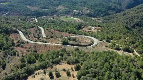 Aerial view of a winding country road in Catalonia