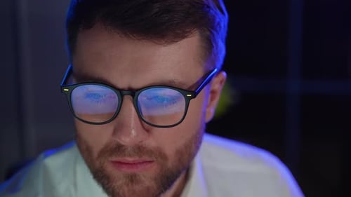 Trader Investor Broker in Eyeglasses and Formal Wear Working with Pc While Sitting in His Office in