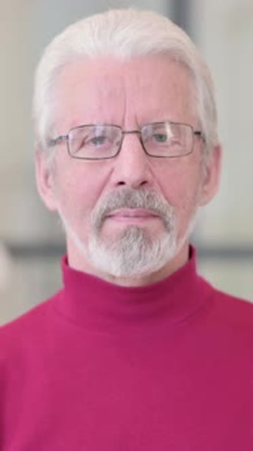 Close Up Portrait of a Senior Man with Glasses