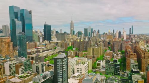 Diverse buildings in New York panorama. City combining usual structures with skyscrapers