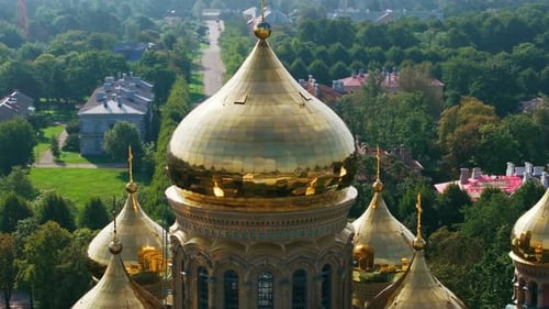 Cinematic angled orbit Saint Nicholas Cathedral dome Karosta Liepaja