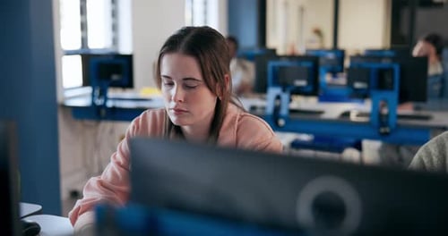 Computer, learning and girl student in classroom for education, lecture or lesson at college