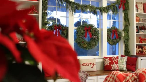 Holiday window bench with christmas wreaths and decorations