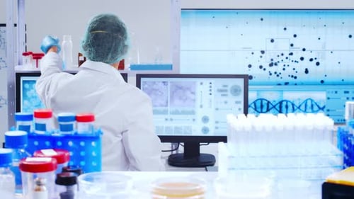 Scientist Working with Test Tubes in a Lab