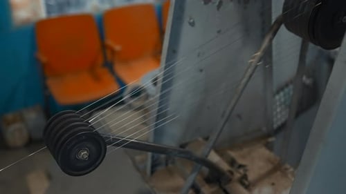 Metal Threads Rotate on Industrial Machine Creative Rotating Shafts with Metal Thread at