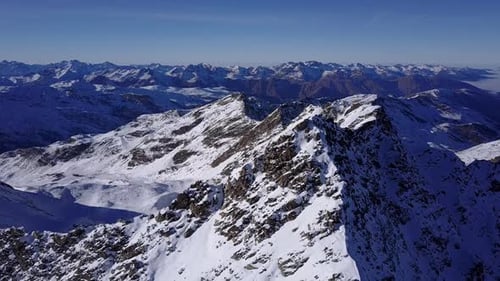 Aerial flight above stunning Alps.
