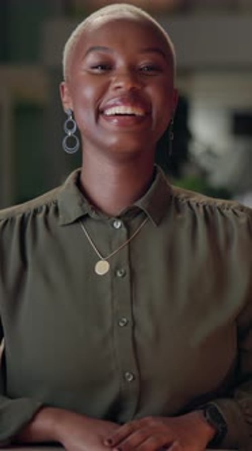 Portrait, black woman and smile in office for business, career success or project deadline at night