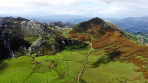 Mountain Scenic Panorama Expansive Outdoor Scenery Showcasing Rolling Hills And Rugged Cliffs Media