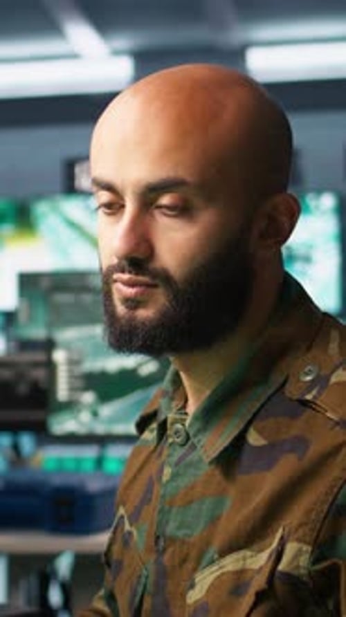 Vertical Video Military Soldier in Mission Control Center Answering Telephone Call