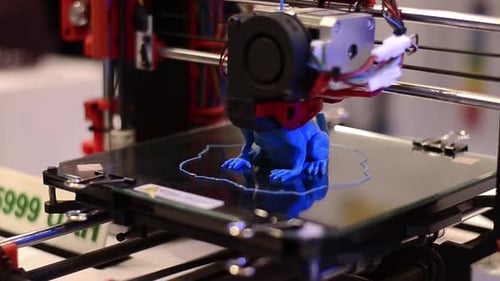 Close Up of 3D Printer Creating Figurine