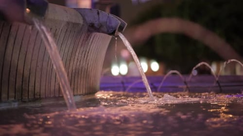 Water jets from the fountain. Water jet. City fountain. Water pressure. How to survive the heat. Hot