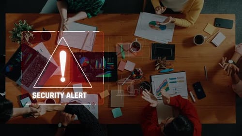 Security Alert Visualization in a Modern Office Setting with People Discussing Data Privacy Measures