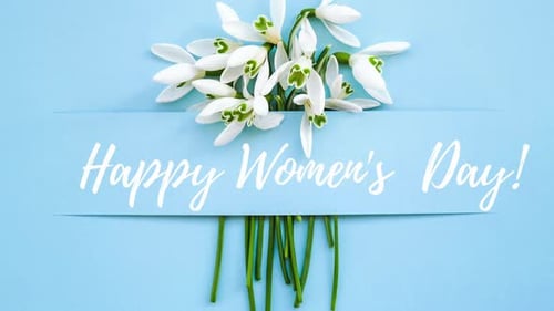 Snowdrop Flowers on Blue Background for Women's Day