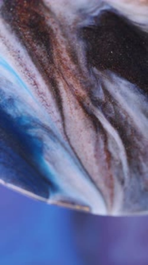 Particules de couleur scintillantes d'encre à diffusion verticale