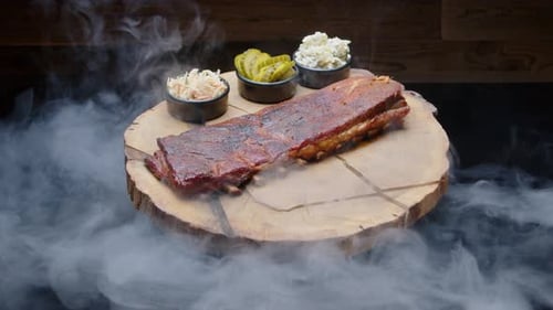 Smoked Ribs with Sides on a Wooden Platter