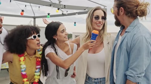 Friends Celebrate Birthday on Urban Rooftop