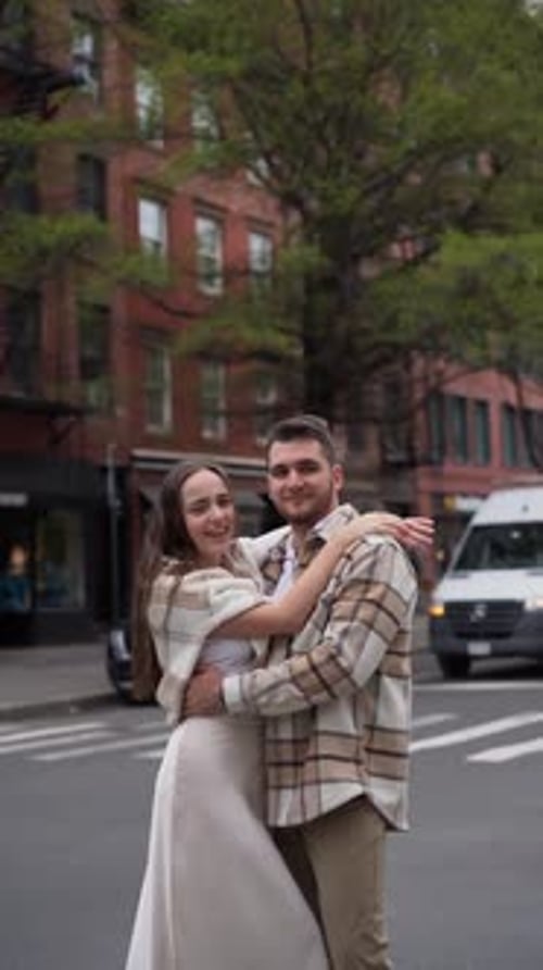 Romantic Couple Embracing on a City Street