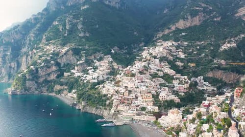 Aerial view of Amalfi Coast village and sea, Italy.