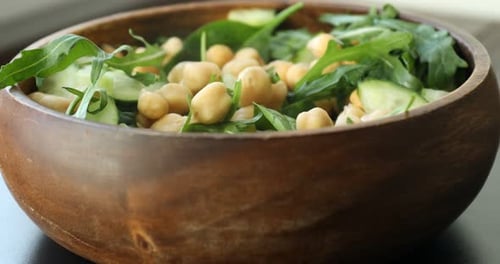 Wooden Bowl Filled with Chickpea Salad