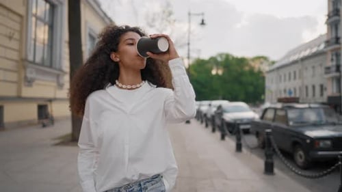 Lifestyle and City Style Portrait of Arab Woman Walking Down Street in Morning Attractive Female