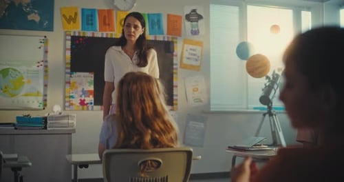 STEM Class Female Teacher Educating Geography to Elementary School Students in Modern Classroom