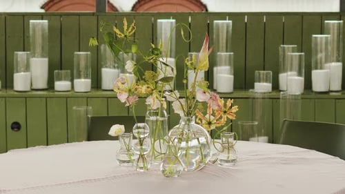 Flowers on Table with Candles