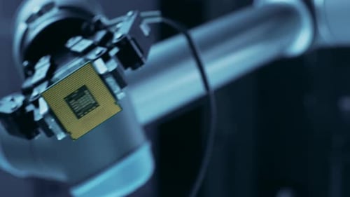 Mechanical Arm Holds Computer CPU in Dark Setting