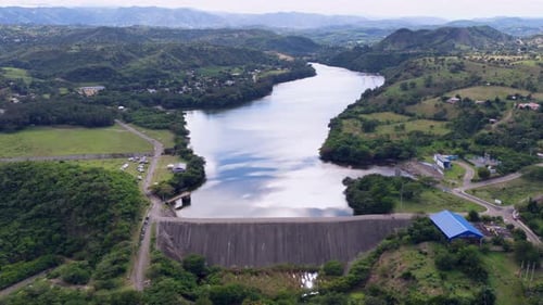 Wide aerial shot of Lopez Angostura dam and lake in Santiago, Dominican Republic