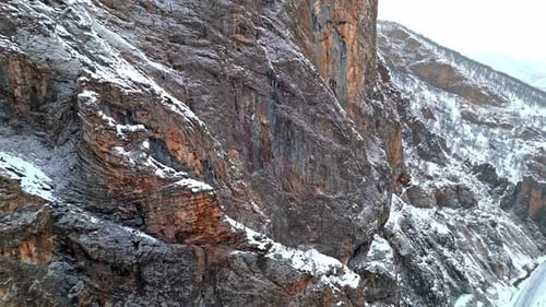 Snowy Rocky Cliff Closeup