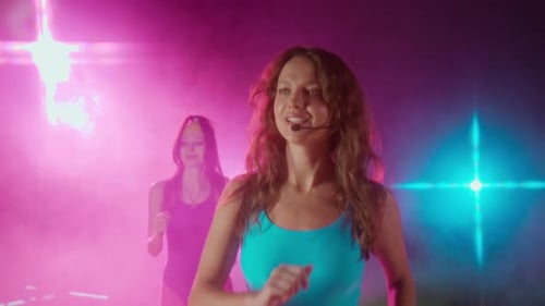 Women in Leotards Doing Retro Aerobics Class in Studio