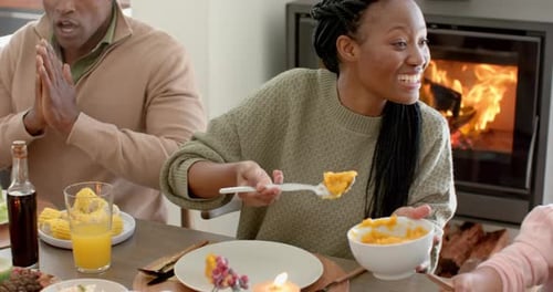 Family Meal Around Dining Table in Cozy Home
