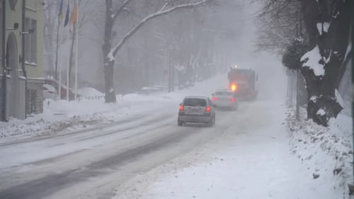 Snow Storm in City Traffic