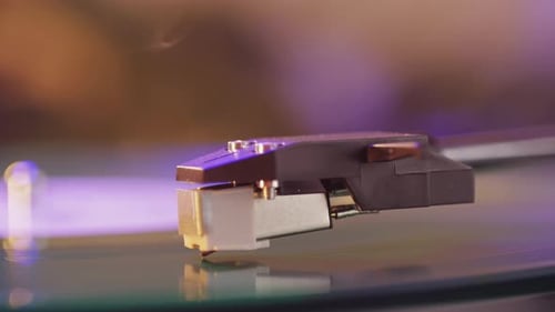 Record Player Needle on Vinyl Record Close Up