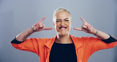 Happy Woman Makes Hand Gesture