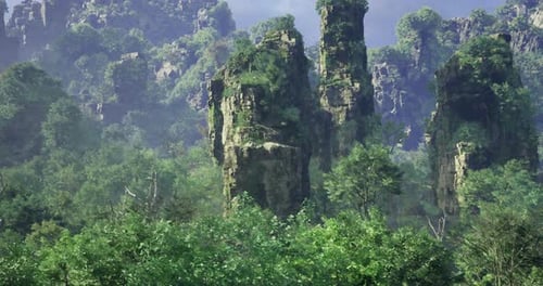Majestic Rock Formations Surrounded By Lush Greenery in Mountainous Area