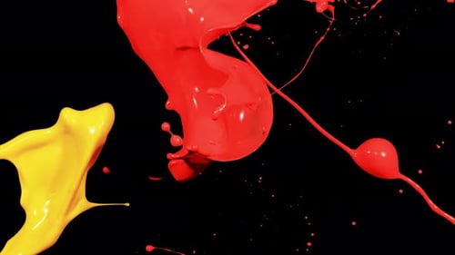 Dynamic Red and Yellow Paint Splashes Transition with Fluid Motion