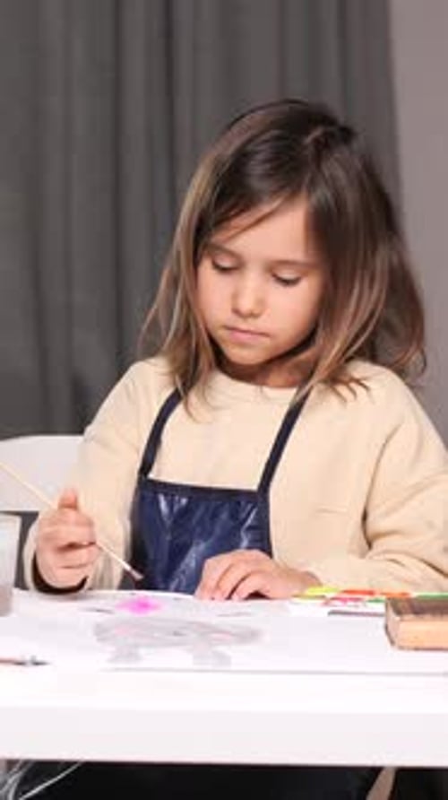 Vertical Video Portrait Little Girl Artist Girl Painting with Watercolors