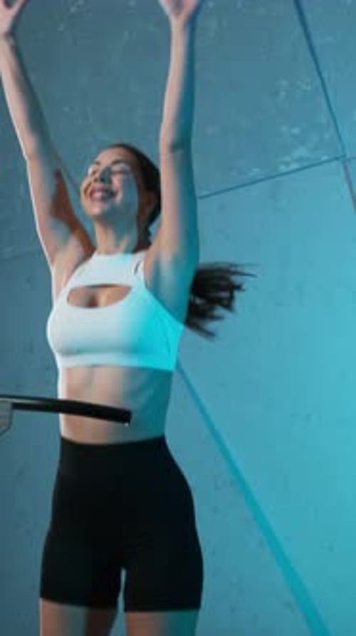 Woman Exercising on a Rebounder Trampoline