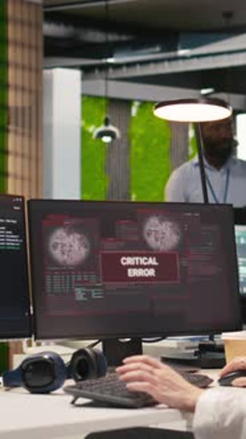 Vertical Video Female Engineer in Startup Office Struggling to Fix Critical Error Warning Popup
