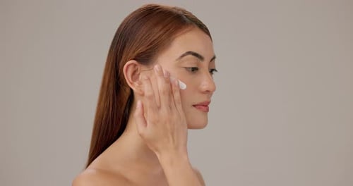 Moisturizer, skincare and woman in studio with natural, hydration and face elasticity