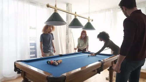 Group of Diverse Friends Playing Pool Game