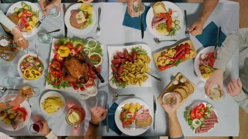 Overhead shot of people dining at dinner table