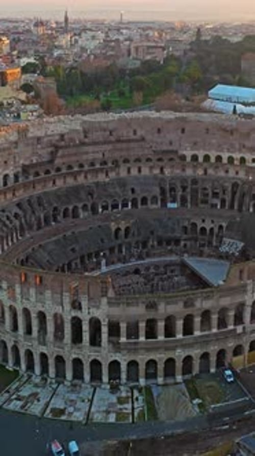Aerial View of Iconic Ancient Arena of Colosseum at Sunset Flavian Amphitheatre in the Heart of Rome