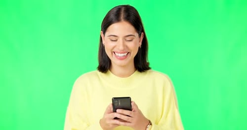 Laughing, woman and smartphone on green screen, studio and reading social media post