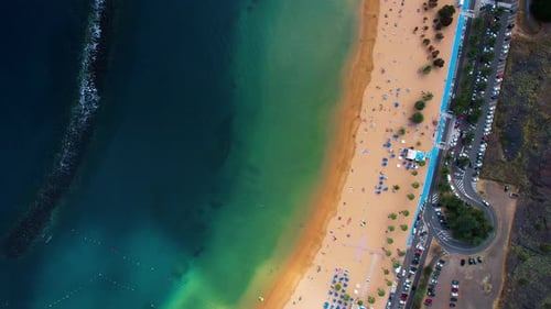 Top View Of Tropical Sandy Beach With Clear Turquoise Water