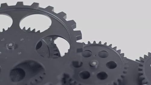 Rotating Black Gears Close-Up